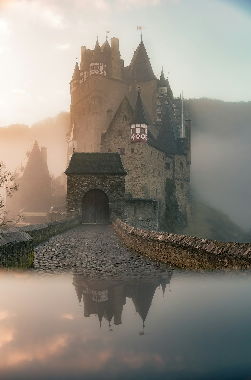 Atmosphere of nighttime forest mist and building silhouettes